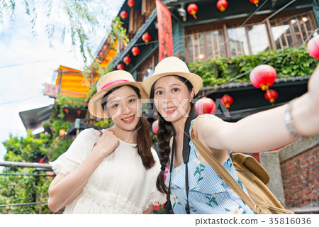 Two girls Taking selfie photograph photo Two girls Taking selfie photograph photo 35816036