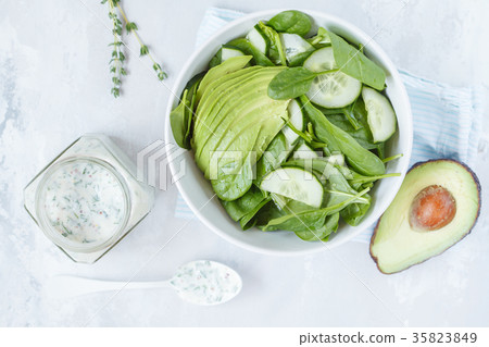 Yogurt mustard dressing to green spinach salad Yogurt mustard dressing to green spinach salad 35823849