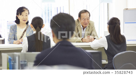 Bank window customer Bank window customer 35828743