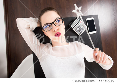 young business woman with moody expression on her young business woman with moody expression on her 35830049