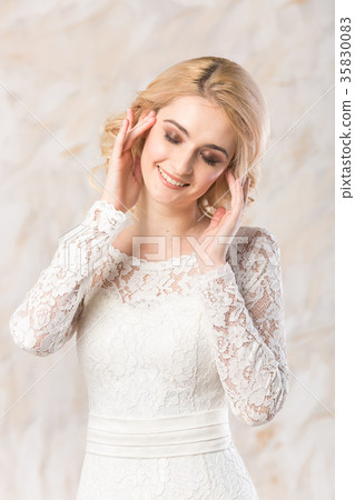 fashionable white gown, beautiful blonde model 35830083