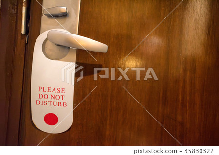 Do not disturb sign on doorknob Do not disturb sign on doorknob 35830322