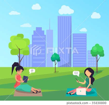 Two Women Sitting on Lawn in Central City Park 35830800