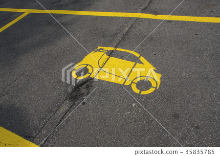 parking spot with a yellow car painted. parking spot with a yellow car painted. 35835785