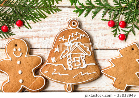 Christmas homemade gingerbread cookies over table Christmas homemade gingerbread cookies over table 35838949