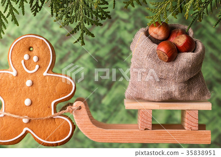 Wooden sled with a bag of nuts. Christmas  concept 35838951