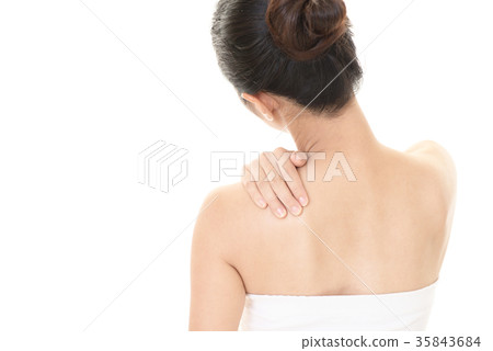 Women complaining of stiff shoulders Women complaining of stiff shoulders 35843684