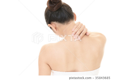 Women complaining of stiff shoulders Women complaining of stiff shoulders 35843685