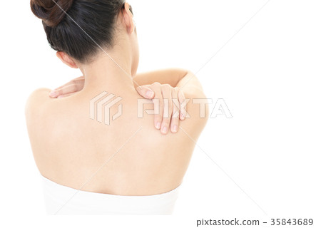 Women complaining of stiff shoulders Women complaining of stiff shoulders 35843689