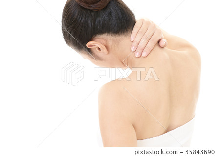 Women complaining of stiff shoulders Women complaining of stiff shoulders 35843690