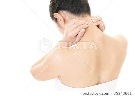 Women complaining of stiff shoulders Women complaining of stiff shoulders 35843691
