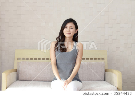 Smiling woman relaxing 35844453