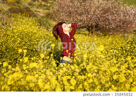 Young woman and flowers 35845032