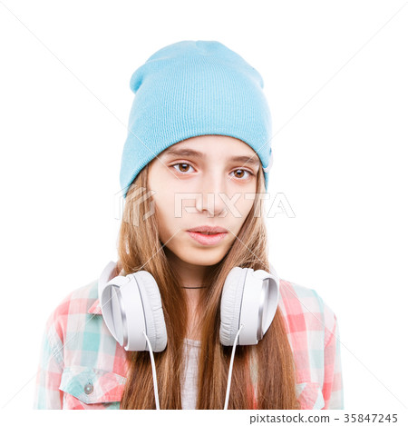 Young happy teenage girl with long beautiful hair Young happy teenage girl with long beautiful hair 35847245