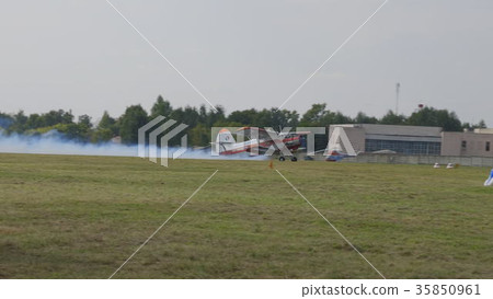 The An-2 aircraft flies in the sky 35850961