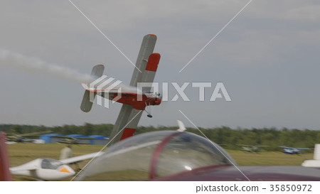 The An-2 aircraft flies in the sky 35850972