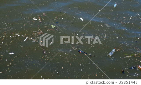 Plastic bags and bottles pollution in ocean washes Plastic bags and bottles pollution in ocean washes 35851443