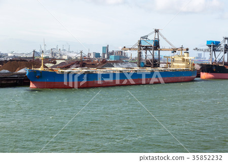 Dry cargo terminal with cargo ship. Dry cargo terminal with cargo ship. 35852232