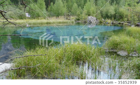 Amazing blue geyser lake in the mountains of Altai Amazing blue geyser lake in the mountains of Altai 35852939