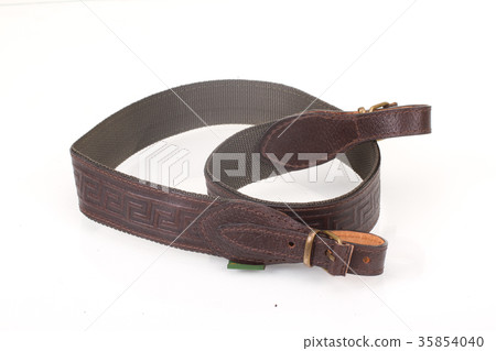 armored brown leather belt on white background armored brown leather belt on white background 35854040