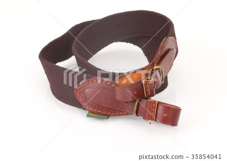 armored brown leather belt on white background armored brown leather belt on white background 35854041
