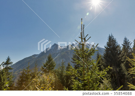 Bright sun over Alpine landscape in Austria. Bright sun over Alpine landscape in Austria. 35854088