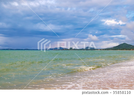 View of cloudy evening at tropical beach View of cloudy evening at tropical beach 35858110