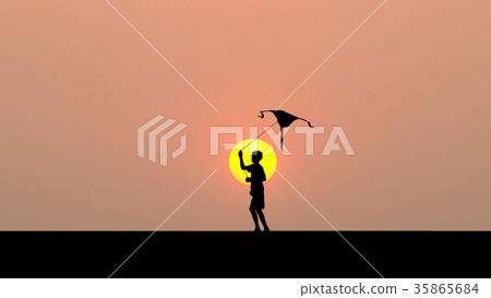 Silhouette of children flying a kite at sunset 35865684