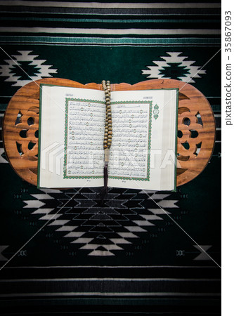 Koran - holy book of Muslims on the carpet 35867093