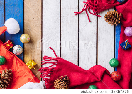 Top view of Christmas decoration on wooden table. Top view of Christmas decoration on wooden table. 35867876
