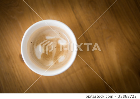 Hot Cappuccino coffee in paper cup Hot Cappuccino coffee in paper cup 35868722