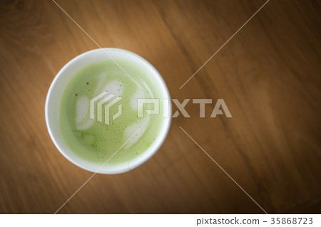 Hot green tea in paper cup 35868723
