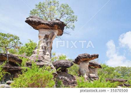 Mushroom stone with blue sky background 35870500