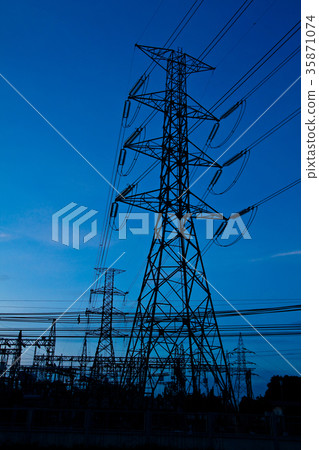 High voltage electricity pillars at sunrise High voltage electricity pillars at sunrise 35871074