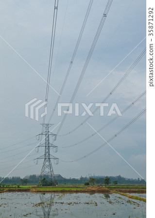 High voltage electricity pillars and blue sky High voltage electricity pillars and blue sky 35871292