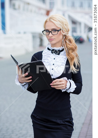 Business lady woman dressed in working serious Business lady woman dressed in working serious 35873064