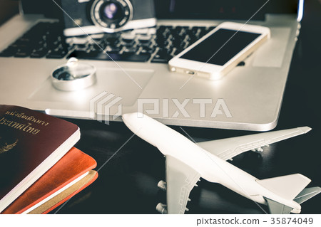 Business traveler object on black desk  35874049