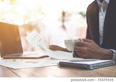 business man accountant working on documents business man accountant working on documents 35874504