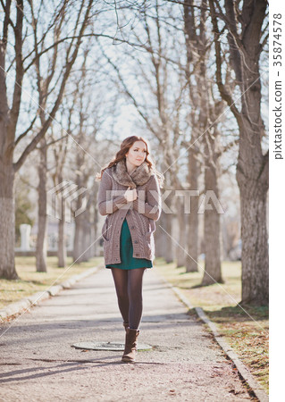 Mysterious adorable young brunette lady  35874578