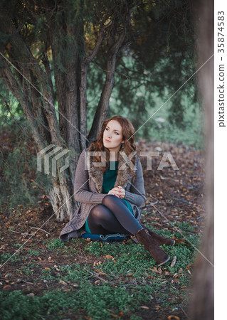 Mysterious adorable young brunette lady  Mysterious adorable young brunette lady  35874583
