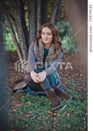 Mysterious adorable young brunette lady  35874585