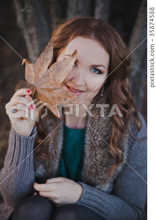 Mysterious adorable young brunette lady Mysterious adorable young brunette lady 35874588