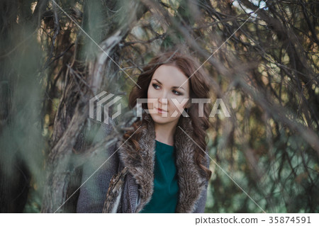 Mysterious adorable young brunette lady Mysterious adorable young brunette lady 35874591