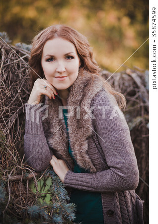 Mysterious adorable young brunette lady  35874599