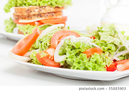 Salad and sandwiches. Selective focus Salad and sandwiches. Selective focus 35883903