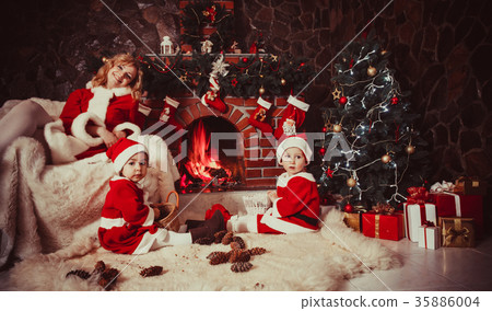 Christmas decorated fireplace Christmas decorated fireplace 35886004