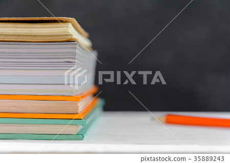 book and pencil on white table black board book and pencil on white table black board 35889243
