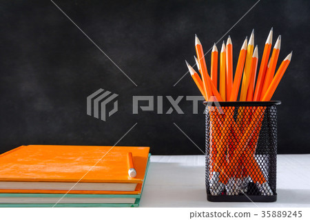 book and pencil on white table black board book and pencil on white table black board 35889245