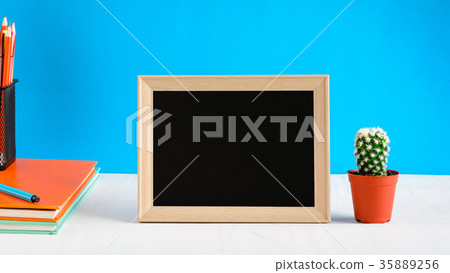 Blackboard with mock up frame and book pencil  35889256