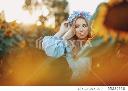 girl and sunflowers 35889338